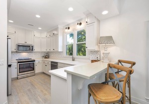 Multi Story home in seaside development with community pool and direct beach access.