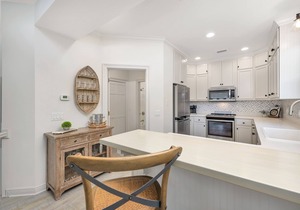Multi Story home in seaside development with community pool and direct beach access.