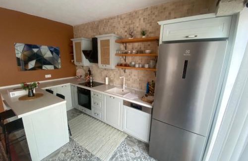 Sifne Mahallesi House | Çeşme'de Villa konforunda alaçatı taş ev tasarımlı sıfır eşyalı