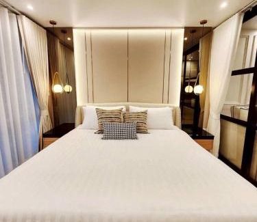 Khlong Toei Nuea Apartment | คอนโดสุขุมวิทสวีท เรียบหรู อบอุ่น ครบครัน