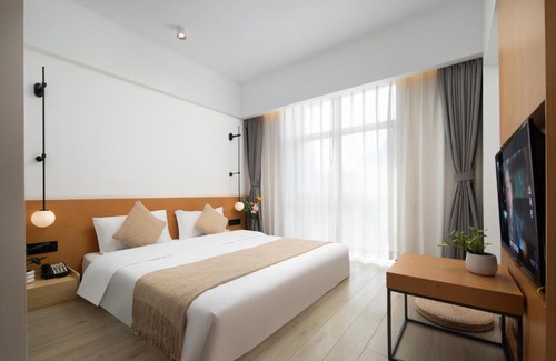Sanya Downtown Hotel | 原野映像酒店