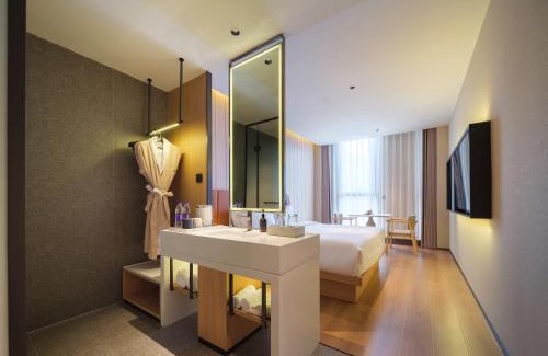 Hongqi District Hotel | 桔作酒店 新乡东站市政府店