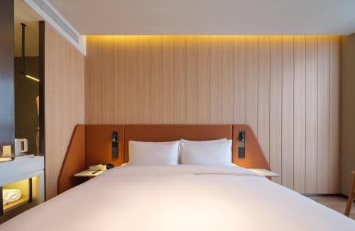 Hongqi District Hotel | 桔作酒店 新乡东站市政府店
