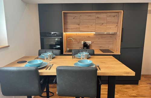 Flintsbach A. Inn Apartment | 1,5-room, top equipped, 4 pers., basement, parking lot, self check-in