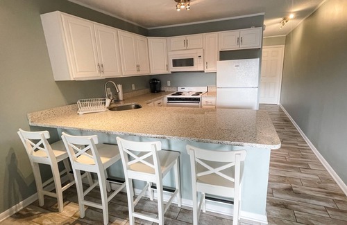 Caine Woods Condo | 1 Bedroom/1 Bath Hidden Gem - Walk to the Beach or Relax Poolside! Sleeps 6.