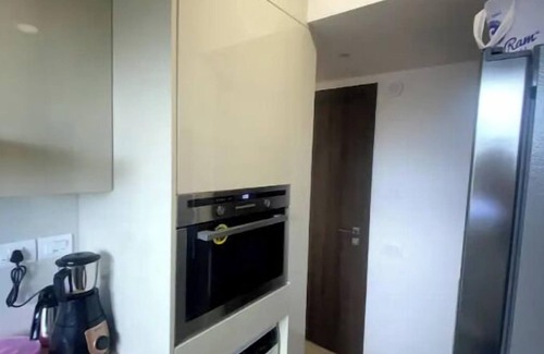 Hiranandani Gardens Apartment | 1-Bedroom Lake View Apartment at Hiranandani Powai