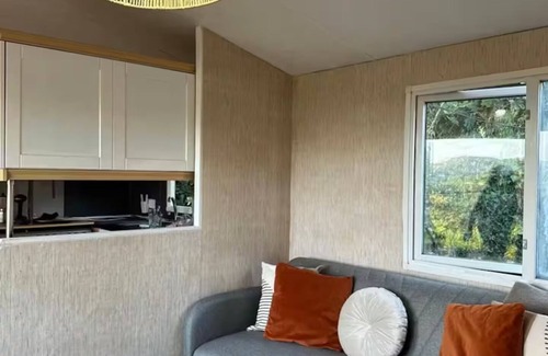 Paredes de Coura Cabin | 1 bedroom wooden caravan with pool and barbecue. sleeps up to 3 people