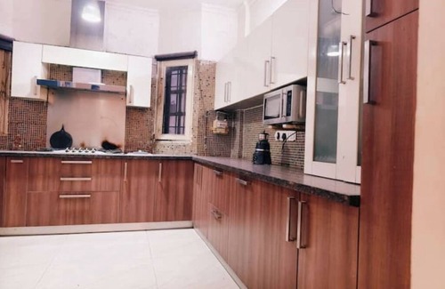 Nehru Place Apartment | 1 BHK- GK1 near M Block Market by HostMyStay