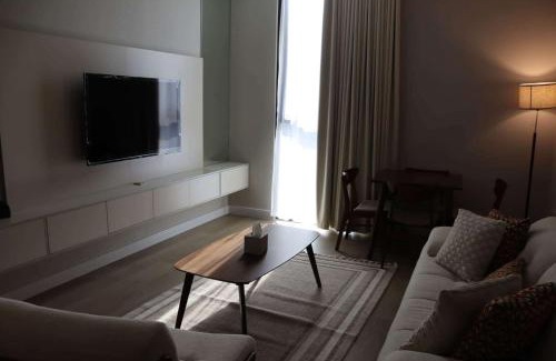 Sharjah Apartment | 1 BR Luxury Apt by AJ Aljada