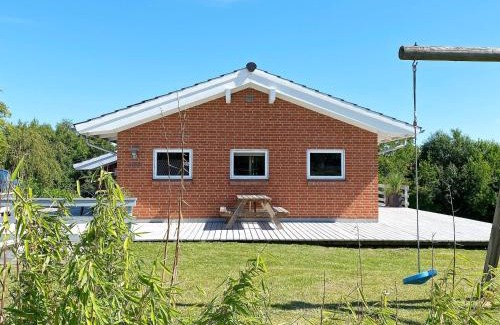 Pøt Strandby House | 10 person holiday home in Juelsminde-By Traum