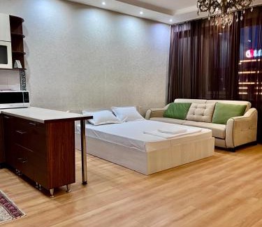 Nur-Sultan Apartment | 153 Уютные апартаменты с видом на Байтерек и поющие фонтаны с 2 кроватями King и диваном на 10 этаже