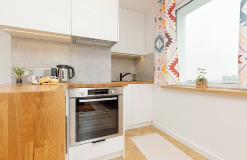 Powisle Apartment | 15th Floor Studio in Warsaw by Renters