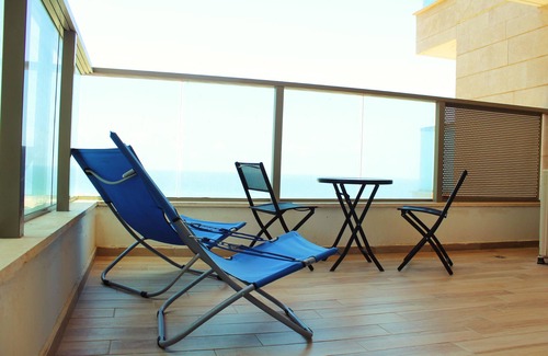 Ashkelon Apartment | 1st Line Beach View; Food & Pool Option. Massage Chair. Steps From Marina Mall