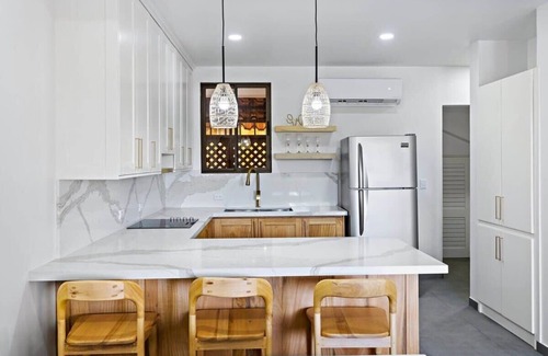 Coco Sunset Hills Apartment | 2-BD Beauty with Pool, Walk to Beach