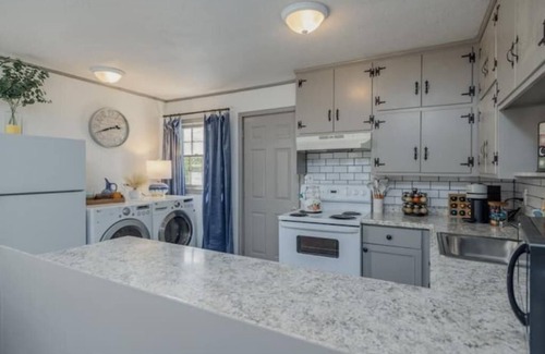 Covington House | 2 bedroom beauty with patio and yard, next to legion field