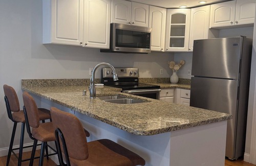 South Boston Condo | 2-bedroom condo with extra beds and HOT TUB in South Boston