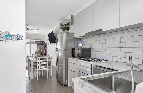 West Beach Apartment | 2 Bedroom Seaside Suite just Steps from the Shore + Arcade & Balcony