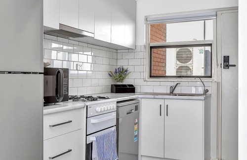 West Beach Apartment | 2 Bedroom Seaside Suite just Steps from the Shore + Arcade & Balcony