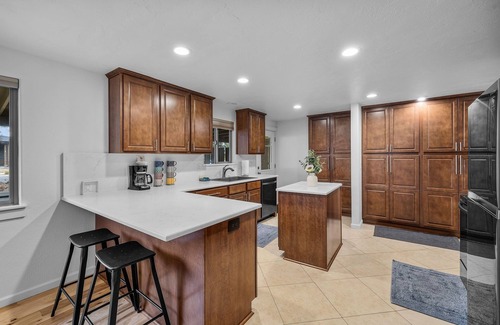 Southeast Bend Condo | 2 Bedrooms, Private Hot Tub, Media Room, Dog friendly with Yard Space. Unit B