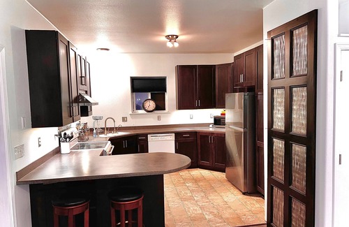Rabbit Creek House | 2 Bedrooms, Sleeps 6-8 with private deck, gym and game room. Near the trails.
