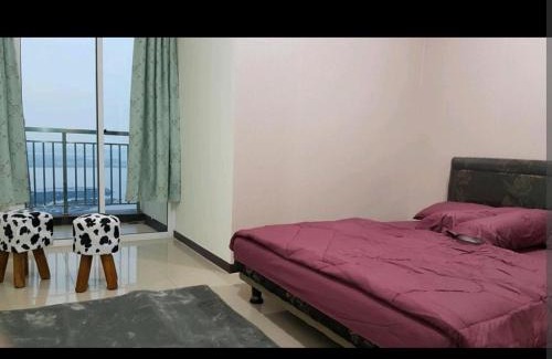 Pluit Apartment | 2 BR Jungle Decor Beautiful Sea View Fast Internet Top Of The Mall