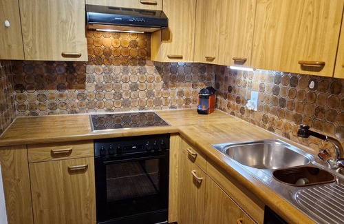Silvaplana Apartment | 2-room flat, height underground parking, cosy living room with sheltered balcony