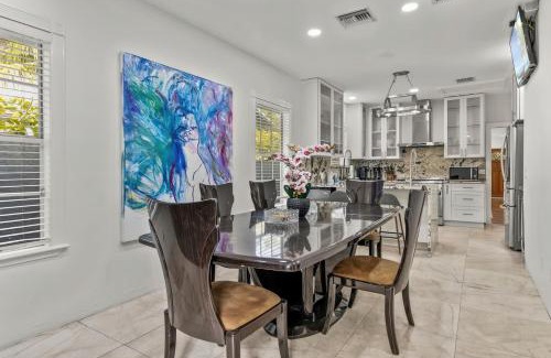 Grandview Heights House | 2 Units w Heated Pool 5BR WPB Retreat N Downtown