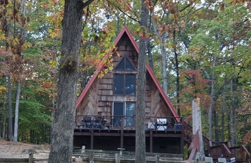 Springville Cabin | 2 wooded acres, 2 king beds & 1 full bed, fire pit & plenty of parking!
