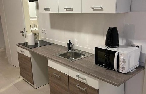 Osnabrueck Apartment | 2 Zi Apartment für Monteure Schlafzimmer mit 2 Einzelbetten, Wohnküche mit Schlafsofa