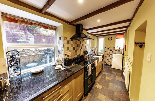 Parkmill Cottage | 200 year old cottage - short walk to the beach