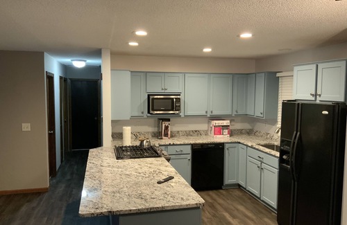 North Saint Paul House | 2000 sq ft home with a swimming pool and a hot tub