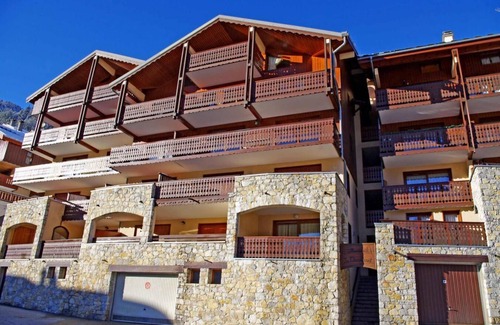 Champagny-en-Vanoise Apartment | 200m from resort center, 3rd floor, balcony, fireplace or stove, parking, tv, ski locker, 54m²