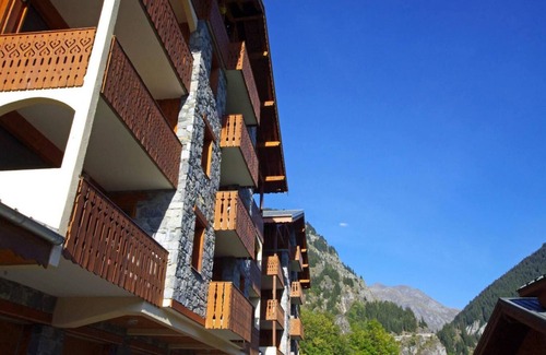 Champagny-en-Vanoise Apartment | 200m from resort center, 3rd floor, balcony, fireplace or stove, parking, tv, ski locker, 54m²