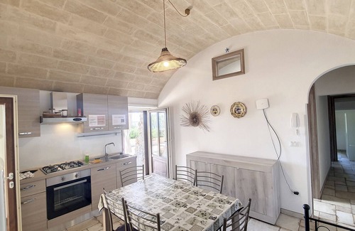 Marina di Felloniche Cottage | 250m from beach: renovated stone house w/jacuzzi