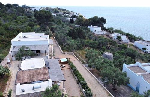 Marina di Felloniche Cottage | 250m from beach: renovated stone house w/jacuzzi