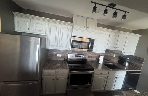 Downtown Omaha Condo | 2B-2B centrally located in Omaha with skyline balcony views.