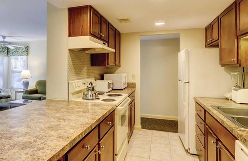 Palmetto Dunes House | 2BR townhome in Palmetto Dunes with pool, beach access, and serene lagoon views