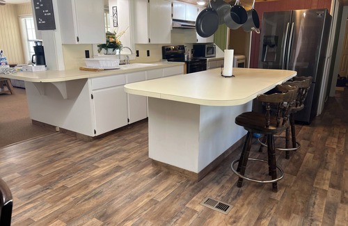 Geneva House | 3 Bedroom 2 bath with plenty of covered parking!