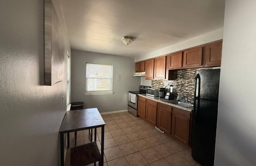 Oak Park Condo | 3-bedroom condo in charming Oak Park with WiFi, AC, laundry, garage and basement