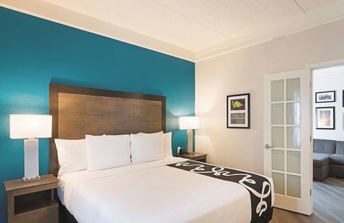 Orlando House | 3 x King Bed Deluxe Suite, Pool View at La Quinta Inn by Wyndham Orlando UCF