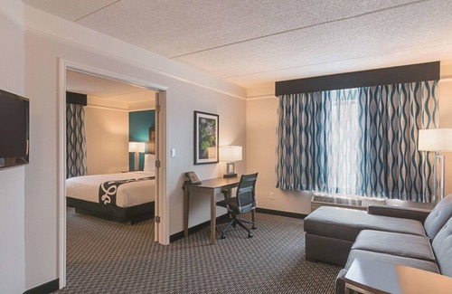 Orlando House | 3 x King Bed Deluxe Suite, Pool View at La Quinta Inn by Wyndham Orlando UCF