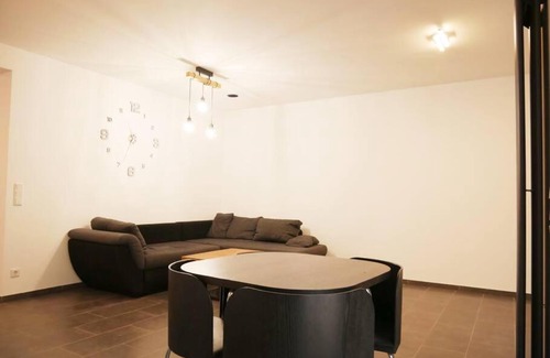 Gruenstadt Apartment | 3 ZKB Einliegerwohnung im Neubau (73m²) mit Ladesäule