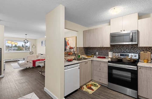 Northeast Edmonton Apartment | 3rd Floor View With Balcony Facing Green Field. Slps 5. Spacious and Stunning