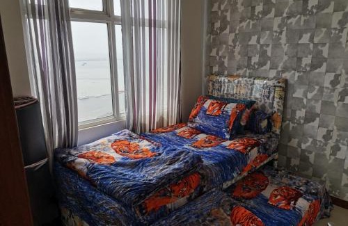 Pluit Apartment | 4 Bed Condo Sleeping by The Sea