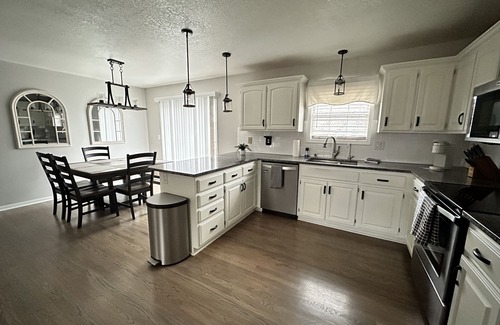 Raymore House | 4 Bedroom House 5 minutes from restaurants and shopping