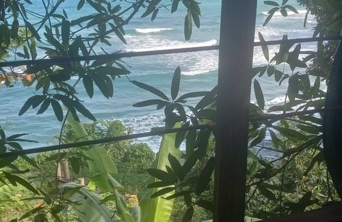 Snow Hill House | 4 story wood bamboo house overlooking sae an beach below