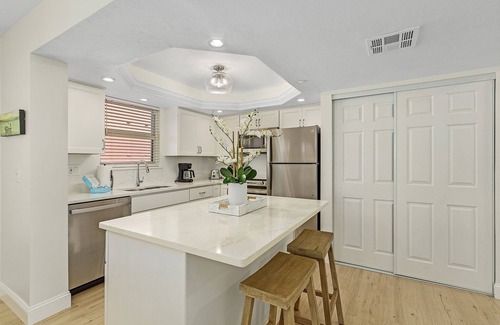 Fort Myers Beach Condo | 406 Estero Island 2BR: Ocean Views, Pool & BBQ Area