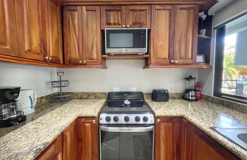 Coco Condo | 5-minute Walk to Beach & Town - Gated - Pool & BBQ