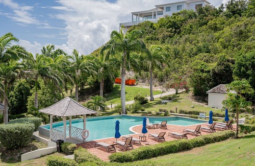 Freetown Apartment | 5 minutes to the beach 2 minutes to our infinity pools spacious 2 bedroom villa,