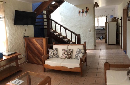Maresias House | 5 suites near the beach, swimming pool, grass beach tennis court, billiards and wi-fi